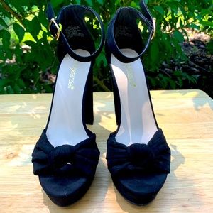 Platform black heels, floral design.